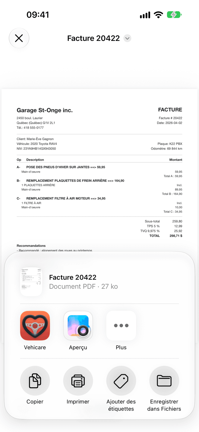 Une facture PDF ouverte dans Fichiers, avec la feuille de partage qui montre Vehicare en premier parmi les apps.