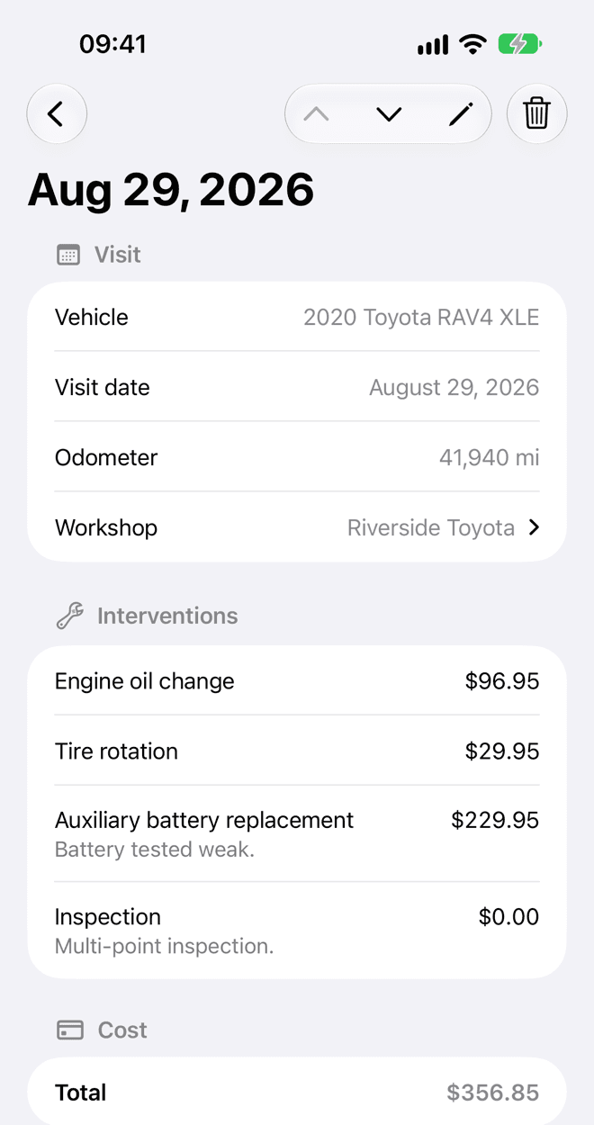 A saved visit: its vehicle, date and odometer, the interventions with their costs, the invoice, the cost, and the workshop.